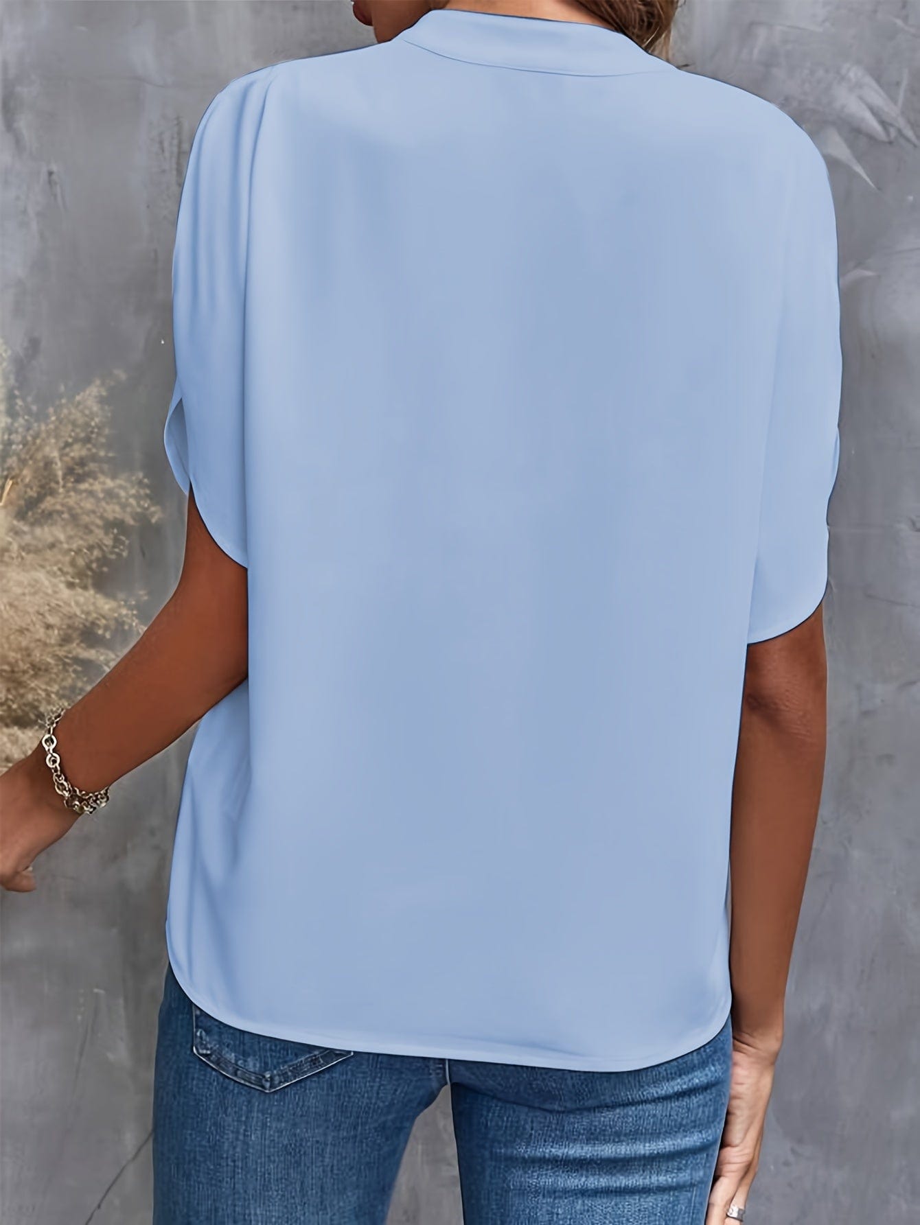 Elegante blouse met plooien