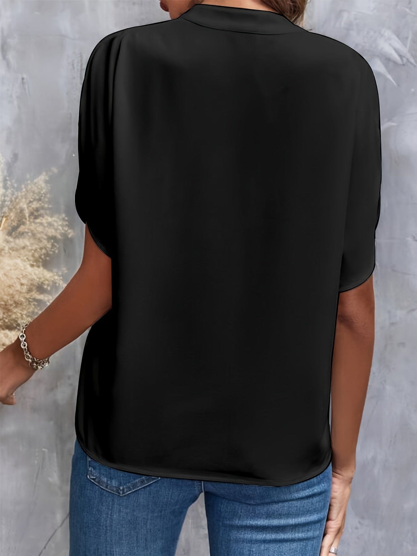 Elegante blouse met plooien