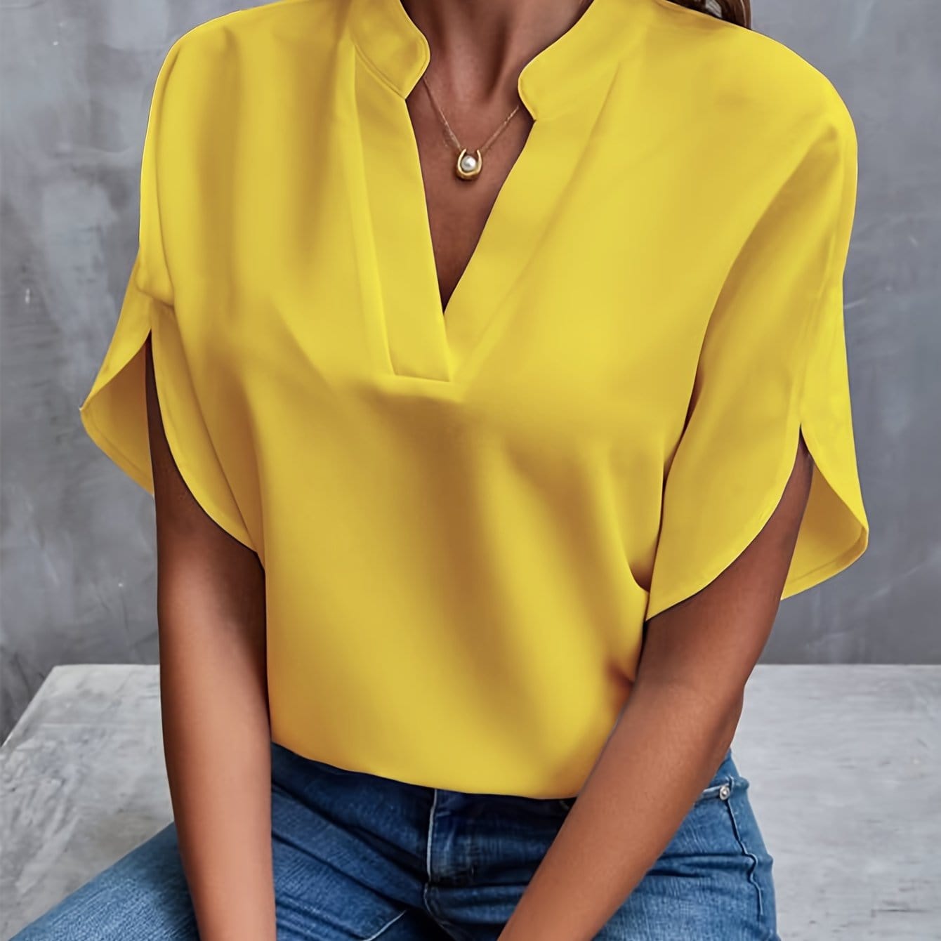Elegante blouse met plooien