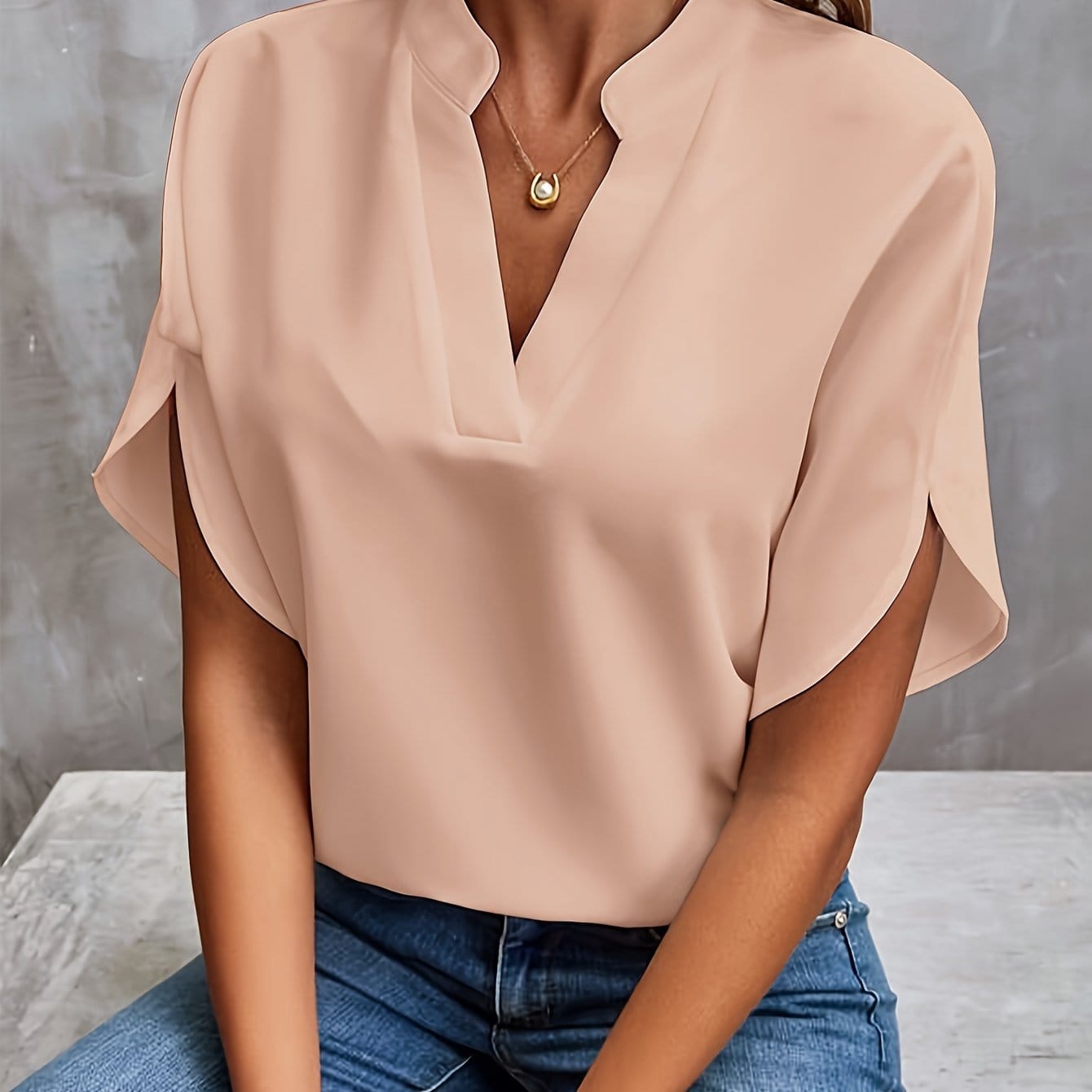 Elegante blouse met plooien