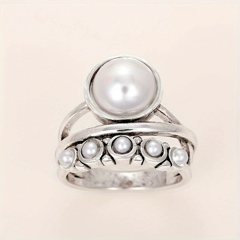 Vintage ring met kunstparel en lagerontwerp
