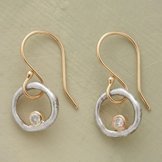 Vintage oorbellen in goud en zilver met zirkonia
