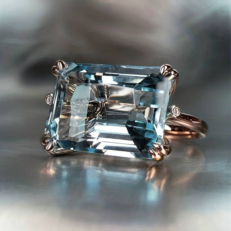 Vintage zilveren oorbellen met blauw zirkonia ringontwerp
